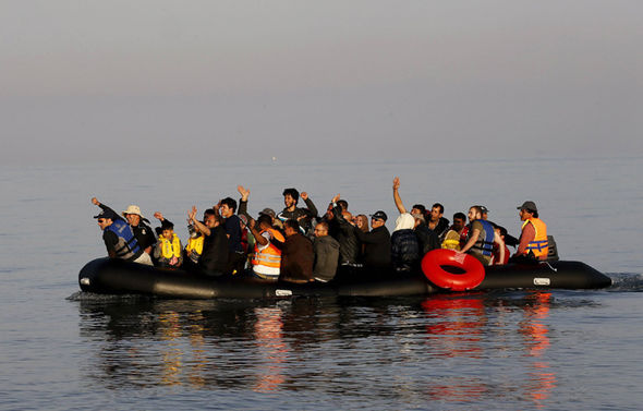 Immigrants on boats towards the Island of Kos, Greece